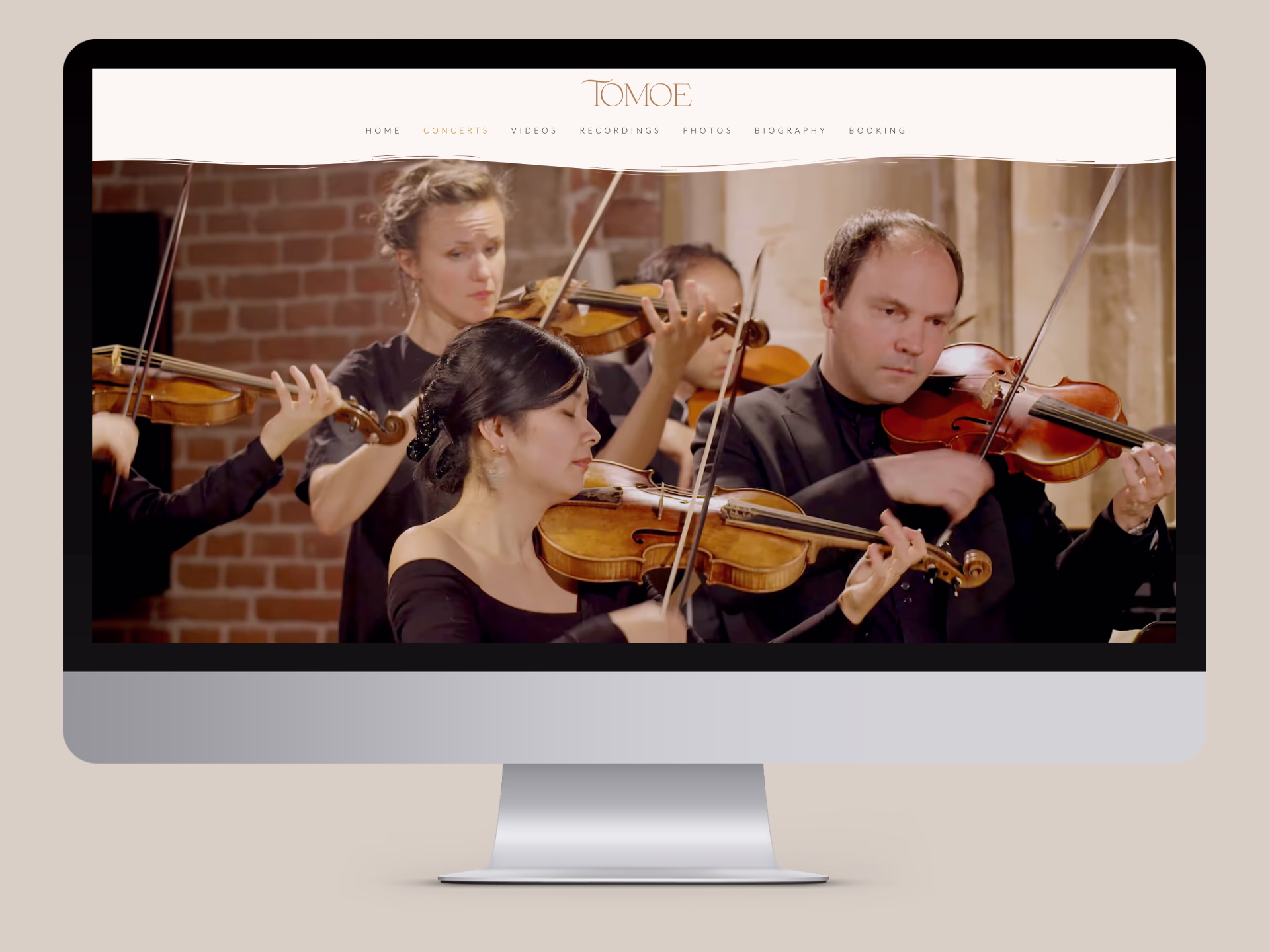 Tomoe redesigned website shown in context